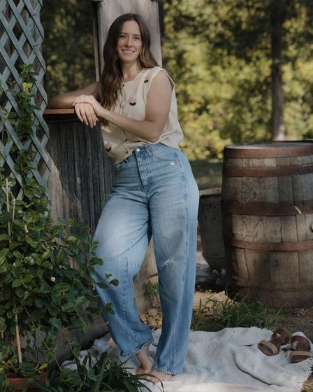Ariel C. Lee by the barn